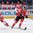 MINSK, BELARUS - MAY 15: Canada's Alexandre Burrows #14 chases down the puck with pressure from Denmark's Phillip Brugisser #2 during preliminary round action at the 2014 IIHF Ice Hockey World Championship. (Photo by Richard Wolowicz/HHOF-IIHF Images)


